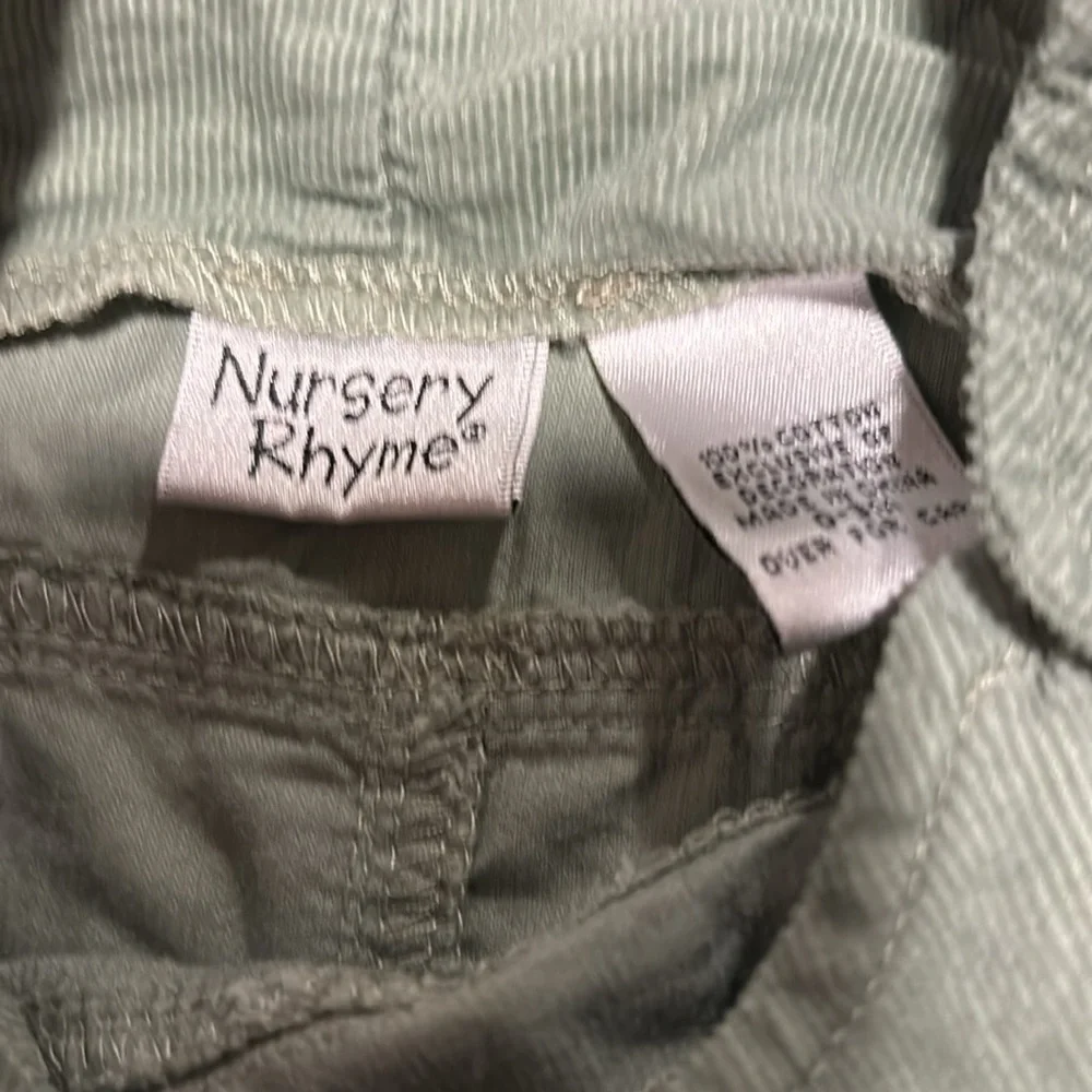 Adorable green dinosaur coveralls overalls with easy buttons. Pair with a onesie